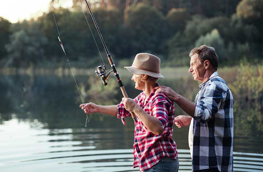 Retired couple fishing together